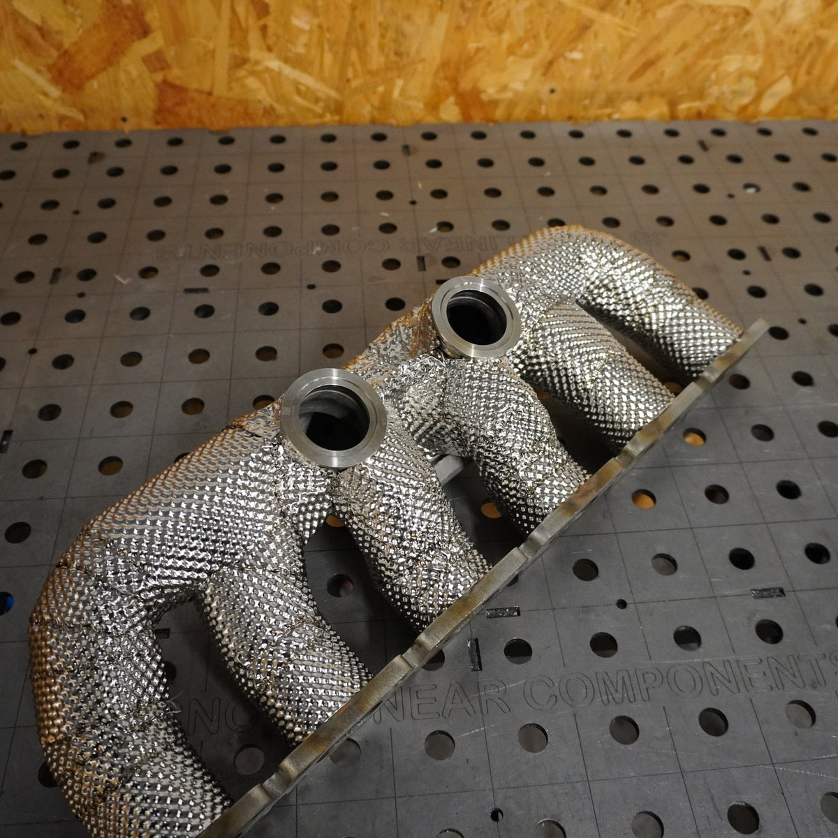 Heat wrap exhaust manifold