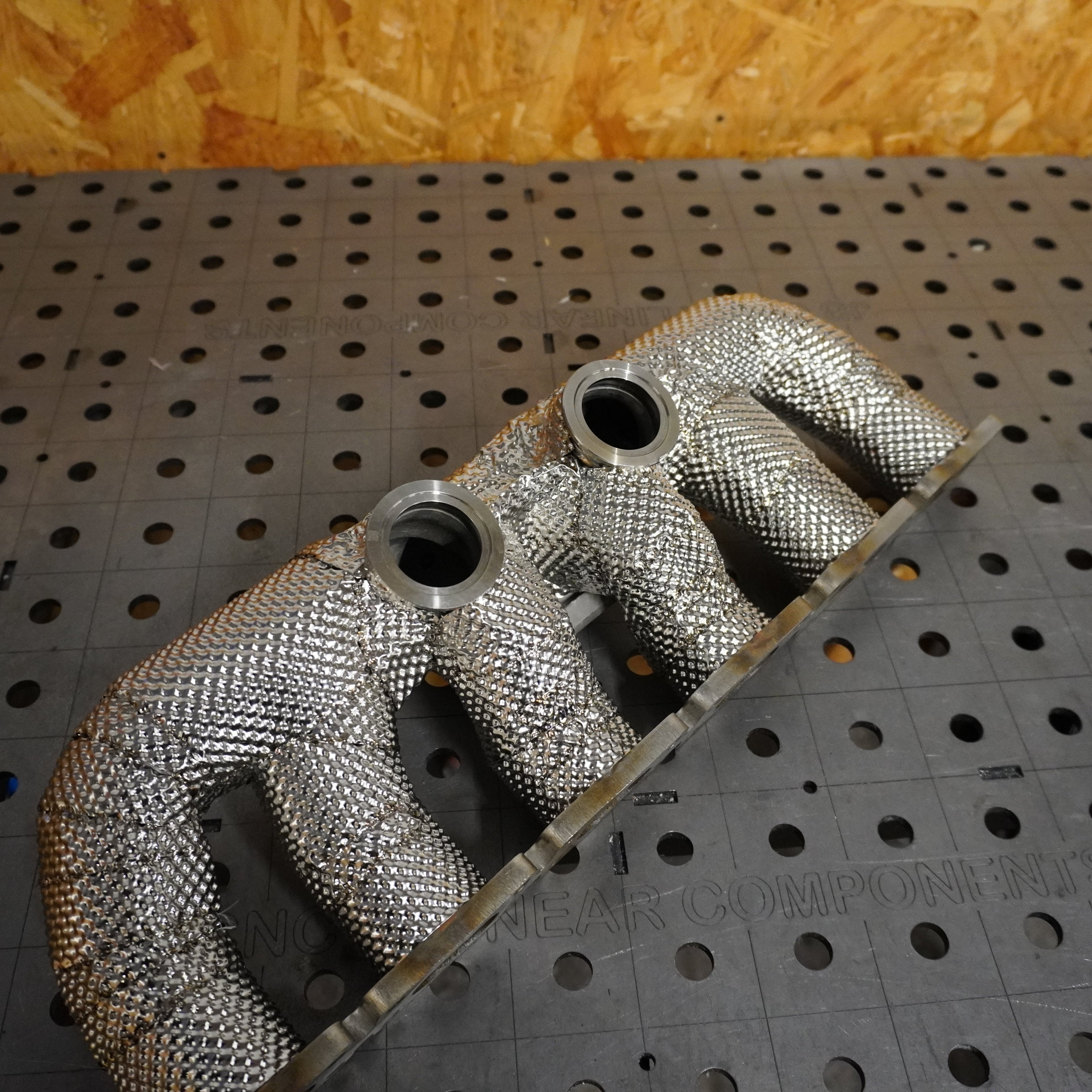 Heat wrap exhaust manifold