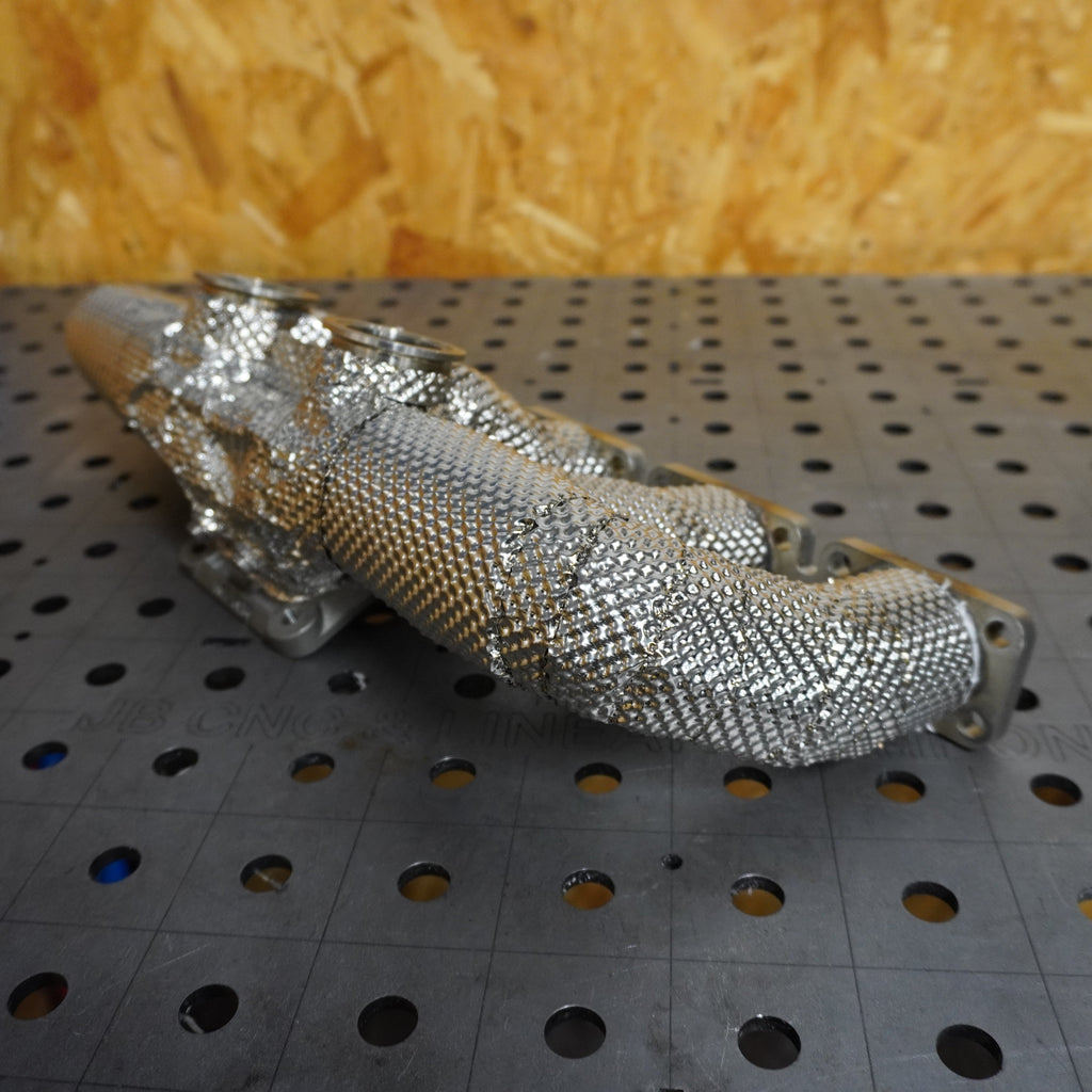 Heat wrap exhaust manifold