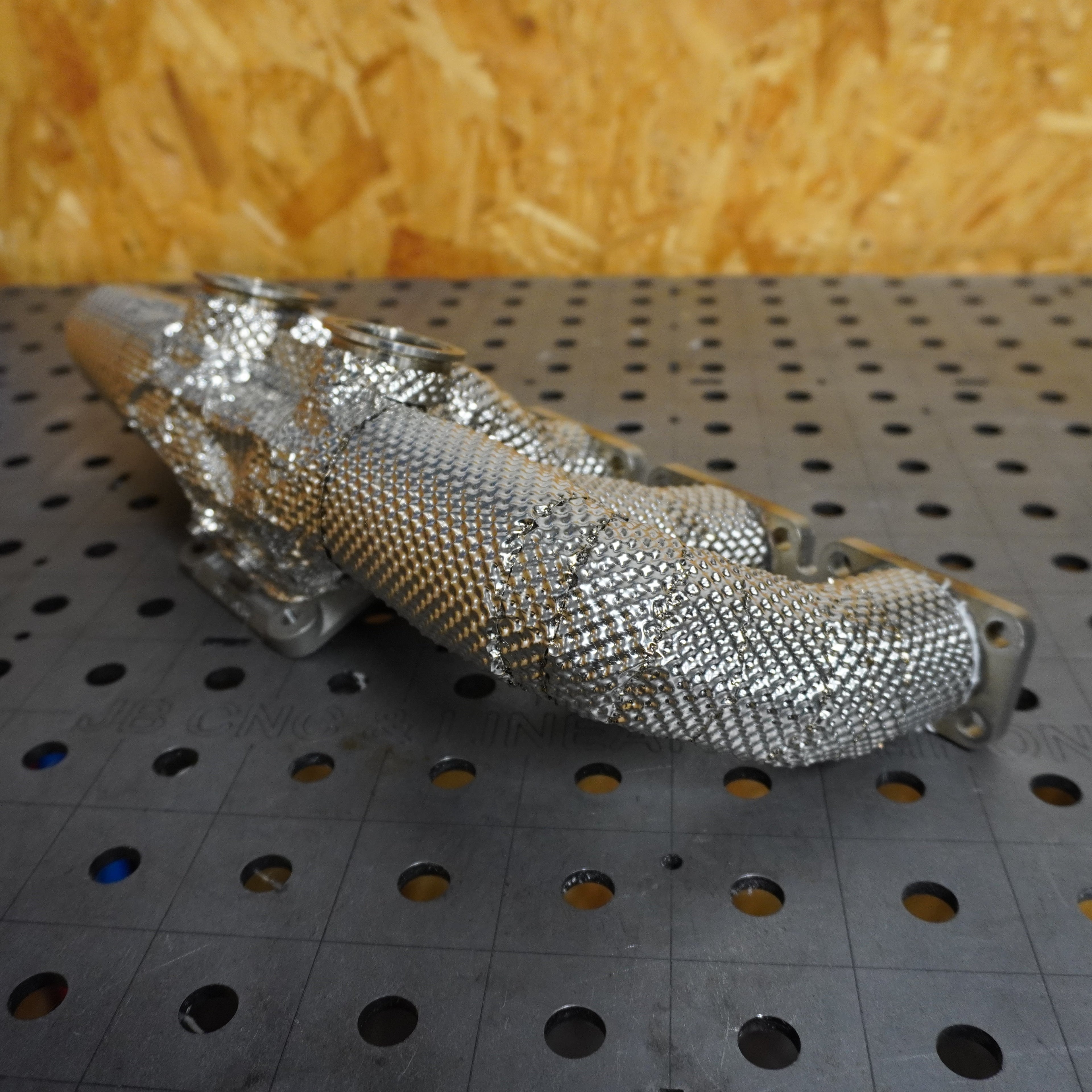 Heat wrap exhaust manifold