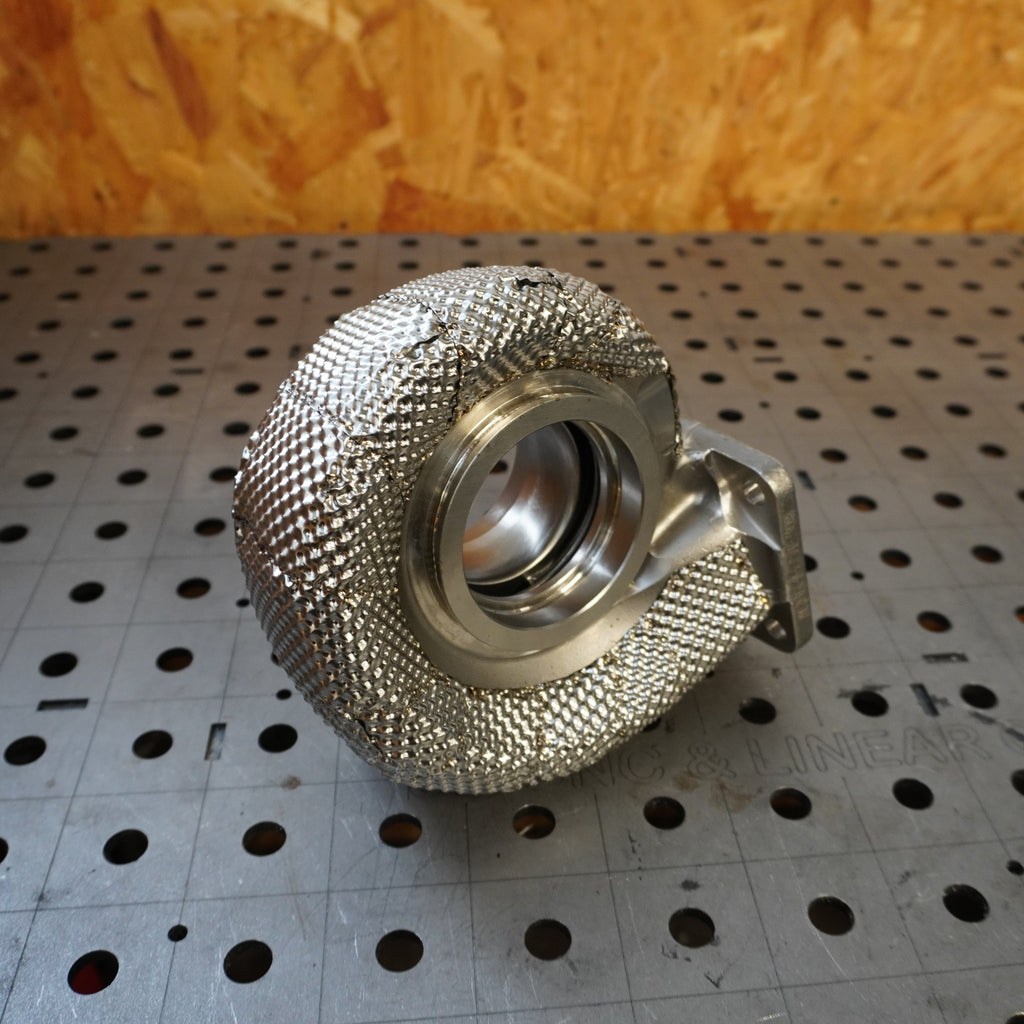 Heat wrap turbo exhaust housing