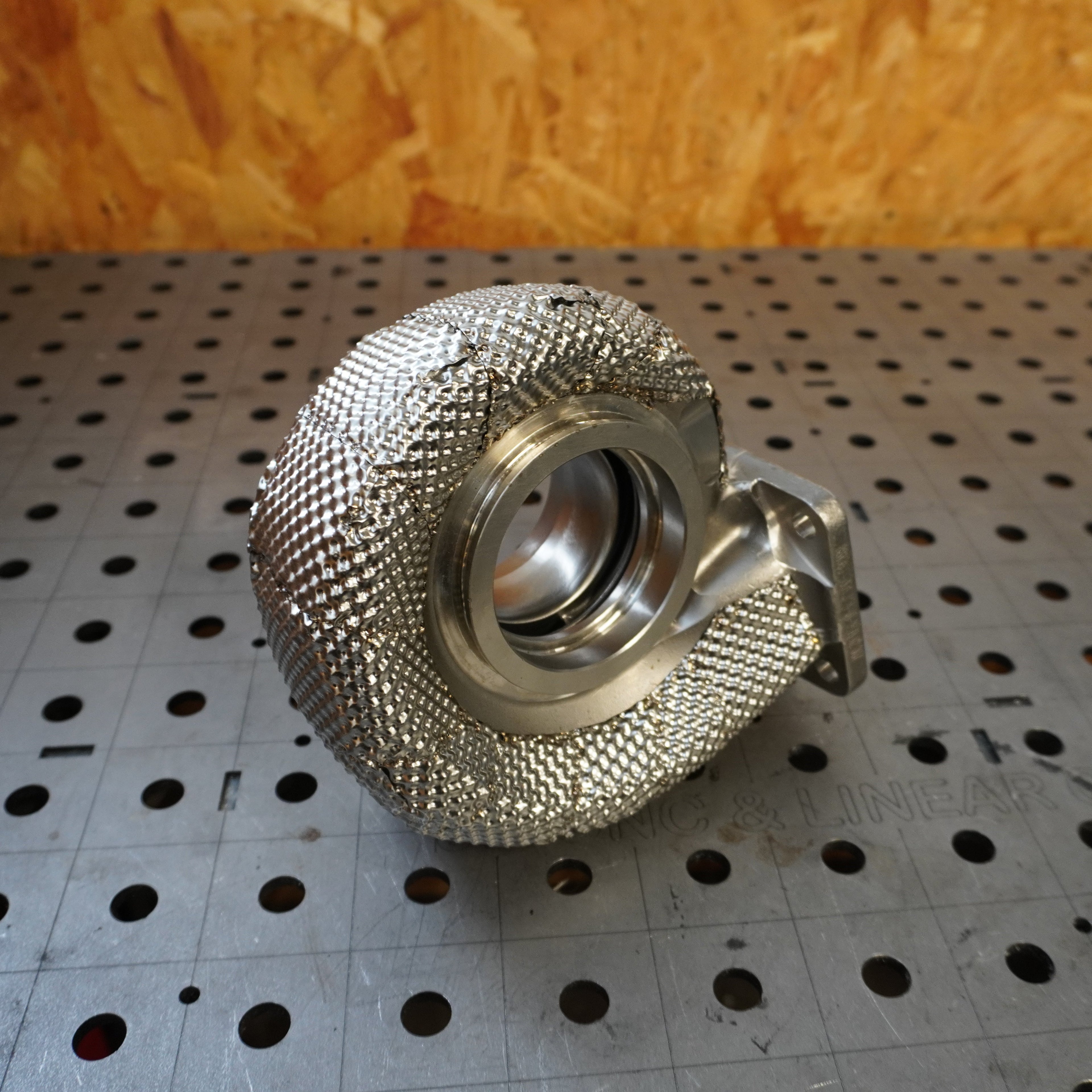 Heat wrap turbo exhaust housing