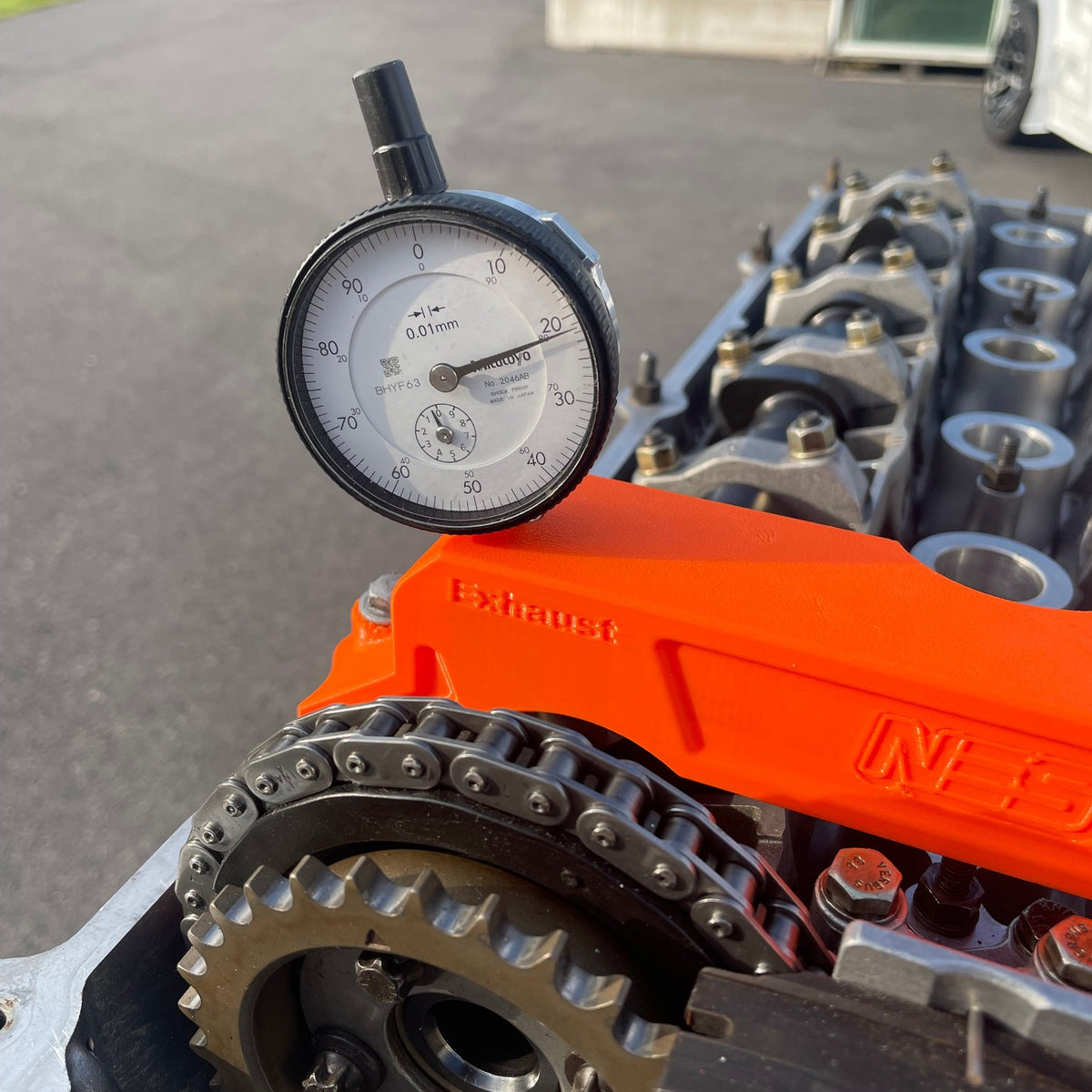 NES camshaft timing kit on BMW engine; dial indicator not included