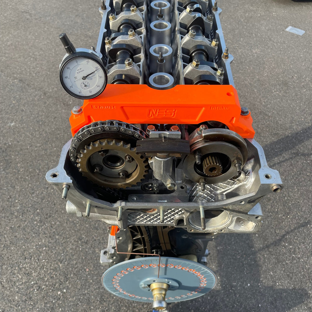 NES camshaft timing kit on BMW engine; dial indicator not included